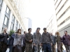 Extras in zombie makup and wardrobe lined up in downtown Atlanta for the start of a scene, "The Walking Dead" June 14, 2011