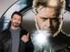 14. Hugh Jackman davanti al character poster di Wolverine